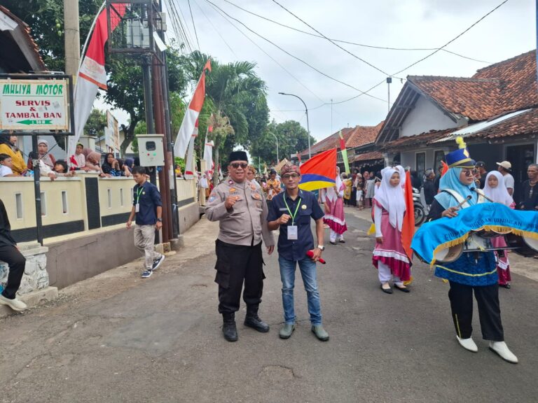 Bhabinkamtibmas Cijagamulya Laksanakan Pengamanan Karnaval Budaya Peringatan Milangkala ke-39 Desa Cijagamulya